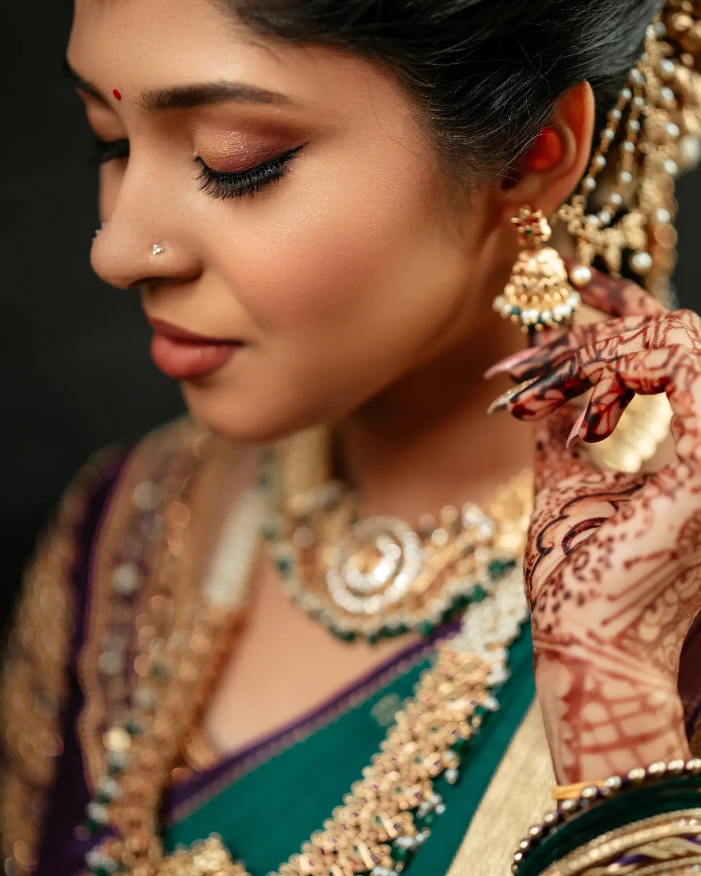 Artistic wedding portrait framed by decorative details